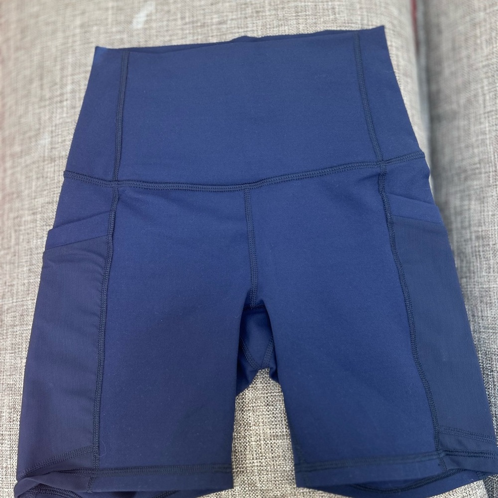 Fabletics Blue High Rise Bike Shorts with Pockets